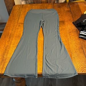 Yogalicious yoga pants size xl never worn. Wide leg. Greenish gray color.
